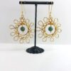 Boucles d’oreilles dorées en forme de soleil